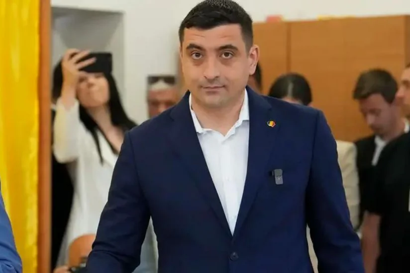 İfrat sağçı siyasətçi Rumıniyada prezident seçkilərinin birinci turunda qalib gəlib