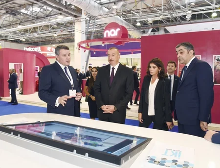 President Ilham Aliyev views Bakutel 2018 exhibition