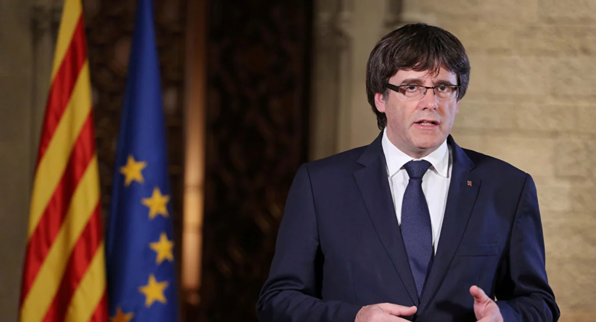 Catalan leader Carles Puigdemont flees to Belgium