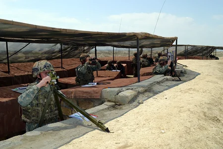 Artillery units carry out combat firing