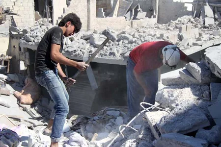 ​Suriyada bir məhəlləyə hücumda 15 nəfər ölüb, onlarla insan yaralanıb - FOTO