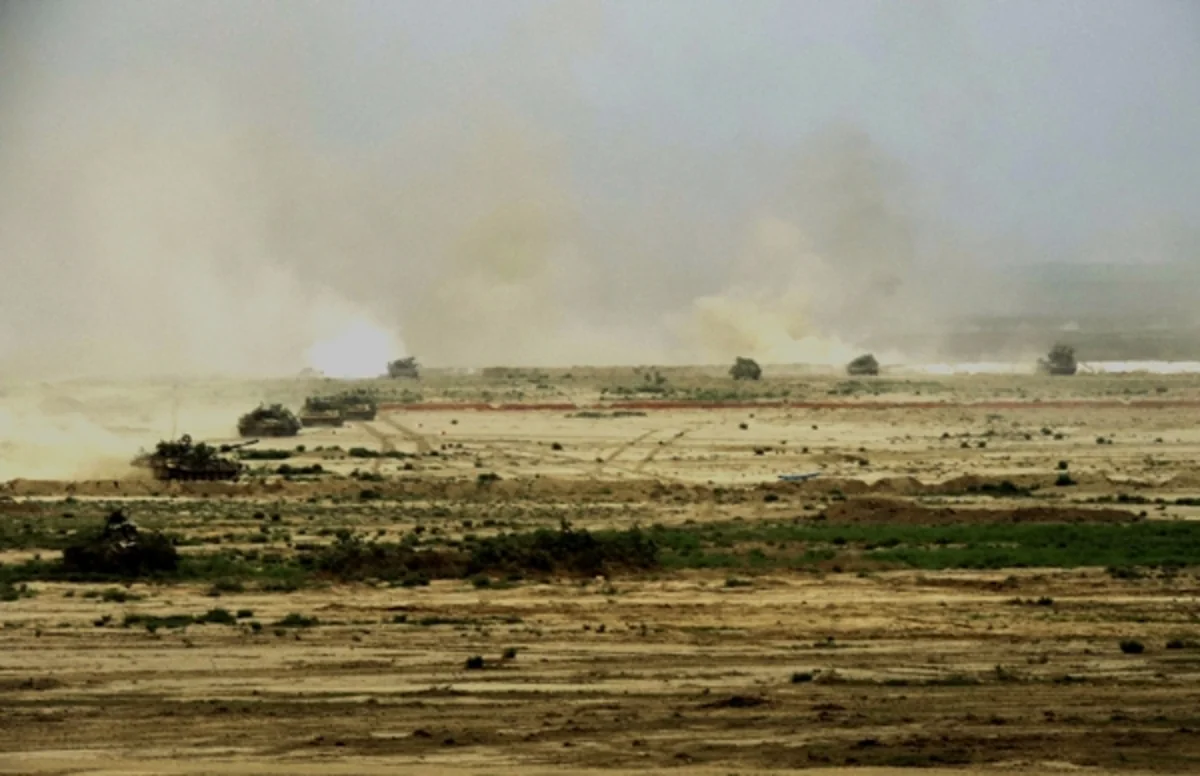 Armored vehicles battle shooting exercises started in frontline zone