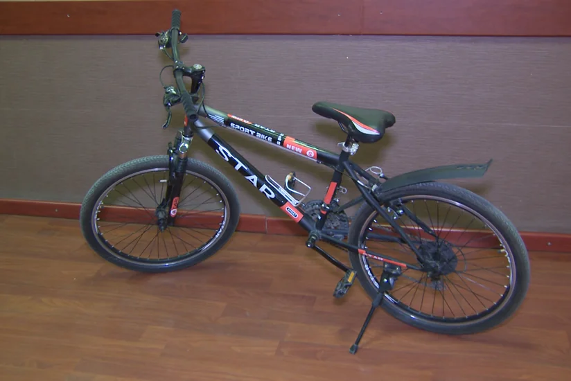 Oğluna velosiped oğurlatdıran ata saxlanıldı