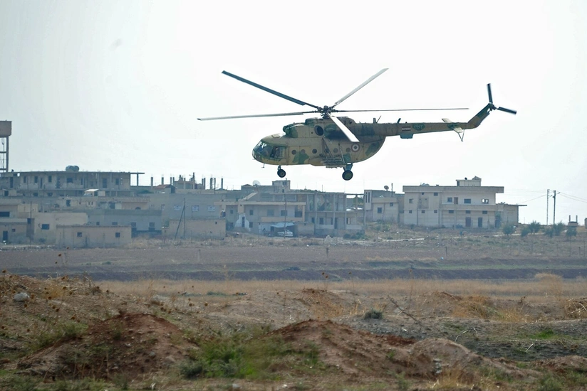 Military helicopter crash in Syria injures 4