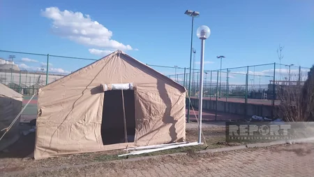 Azerbaijani rescuers setting up another temporary tent camp in Kahramanmaras