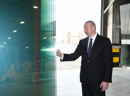 Президент заложил фундамент двух заводов и открыл предприятие в Сумгайыте
