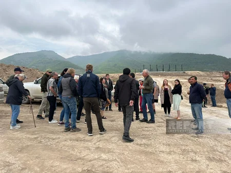 Swedish travelers view restoration work in Lachin