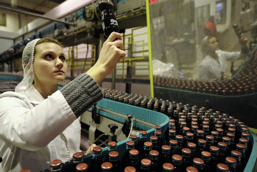 Coca-Cola laying off 2,200 workers as it pares brands