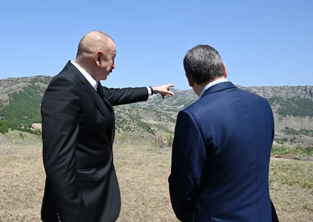 President Ilham Aliyev and Gurbanguly Berdimuhamedov pose for photo against backdrop of Dashalty village in Shusha district