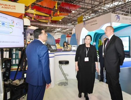 President Ilham Aliyev views Bakutel 2018 exhibition