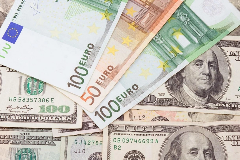 Dollar exceeds euro for first time in 20 years