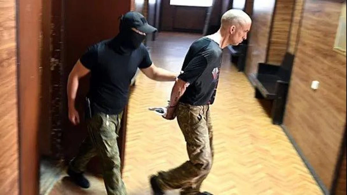 British man held by Russians dies