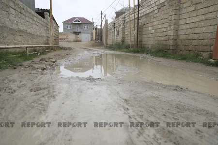Binə sakinləri: Yollarımız keçilməzdir, içməli suyu pulla alırıq
