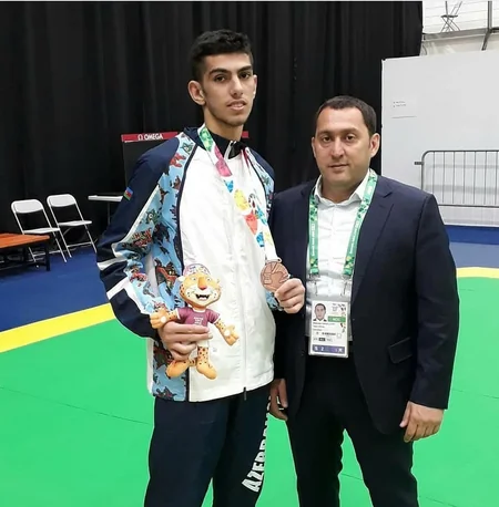 Azerbaijani taekwondo wrestler wins bronze award in junior Olympics - PHOTO