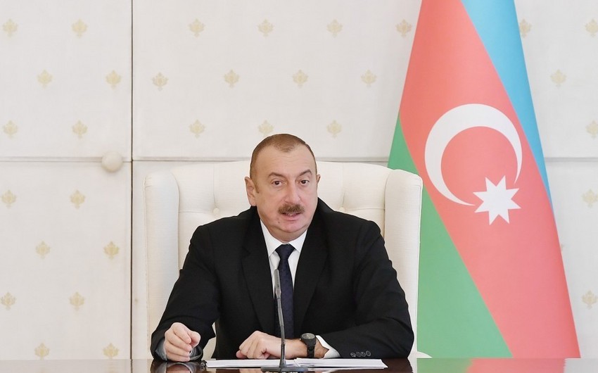 İlham Əliyev: Binalar, evlər hansısa qanunsuz yollarla sənədləşdirilir və biz artıq fakt qarşısında qalırıq