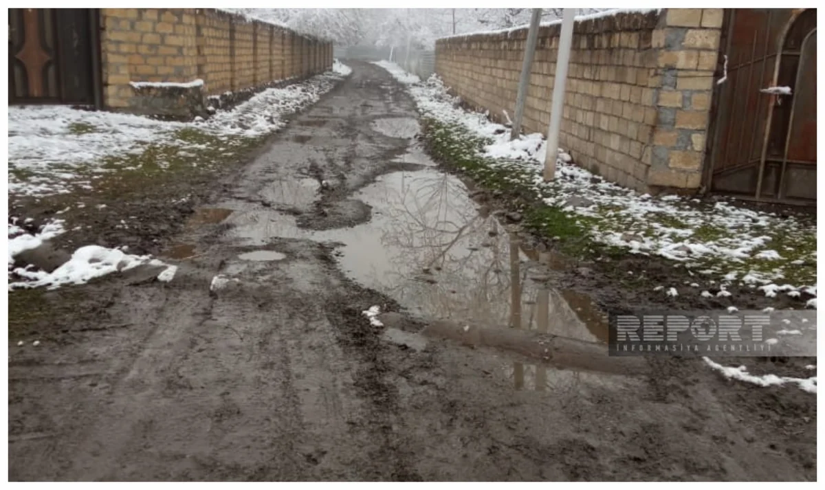 Oğuzda kənd yolu bərbad vəziyyətə düşüb: sakinlərin gediş-gəlişi çətinləşib
