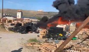 Xocəsəndə taxta yeşiklər yığılmış ərazi yanır 