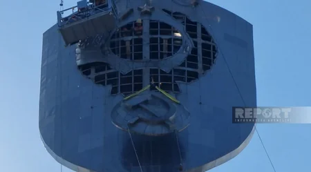 Kyiv dismantling USSR coat of arms from Ukraine's highest monument - Photos