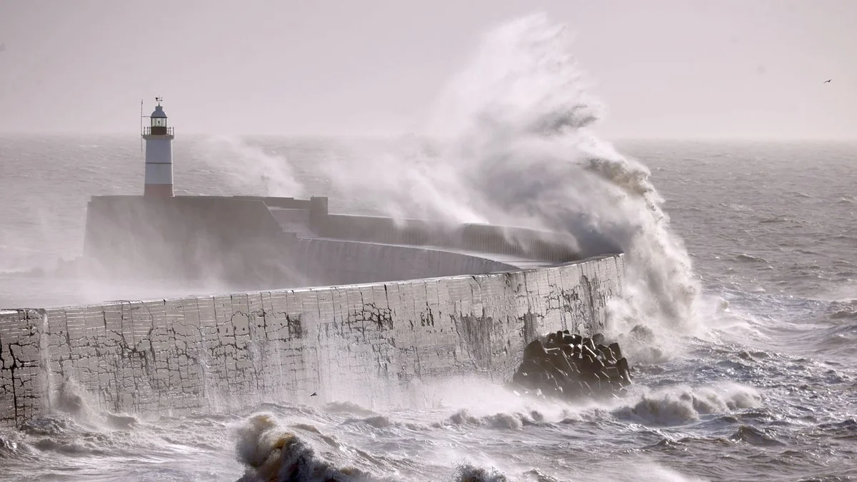 Thousands in UK without power and train services disrupted after Storm Darragh