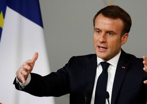 Macron advises French to work harder