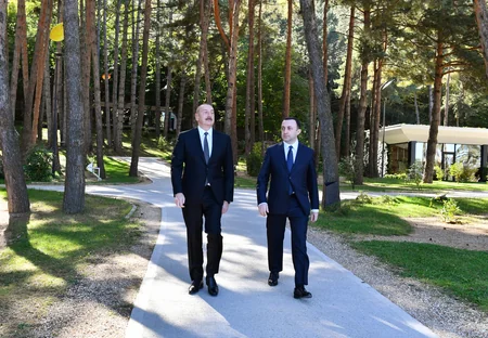 President Ilham Aliyev and Prime Minister Irakli Garibashvili view photo exhibition dedicated to 100th anniversary of National Leader Heydar Aliyev