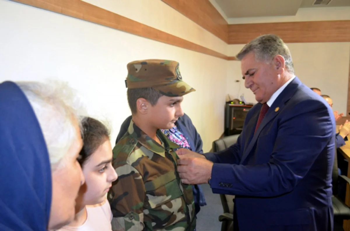 Biləsuvarda şəhid ailələrinə medallar təqdim olunub