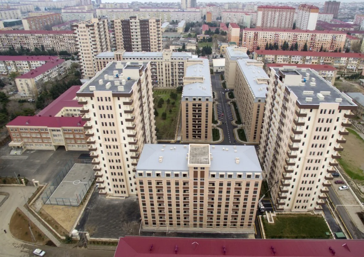 President Ilham Aliyev attends opening of residential building complex for refugee and IDP families in Sumgayit