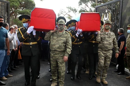 Zakir Həsənov şəhid generalla vida mərasimində iştirak edib