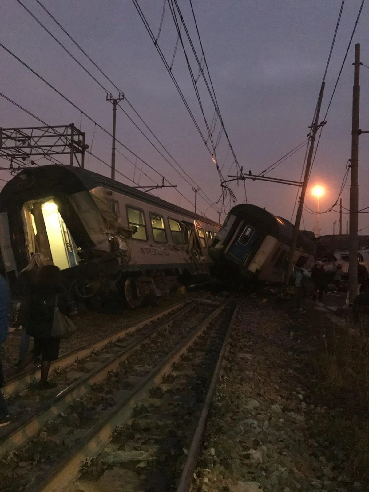 Train gone off rails in north Italy, dead and wounded reported
