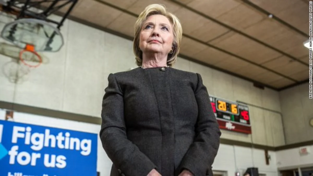 Hillary Clinton claims narrow victory in Iowa