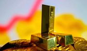 Стоимость фьючерса на золото снизилась почти на 2%