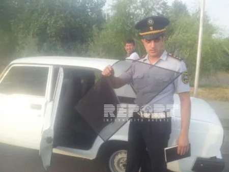 Avtomobilinə şüar yazan sürücü cərimələnib - FOTO