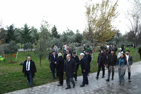 International conference participants in Baku plant trees in Zira Ecopark