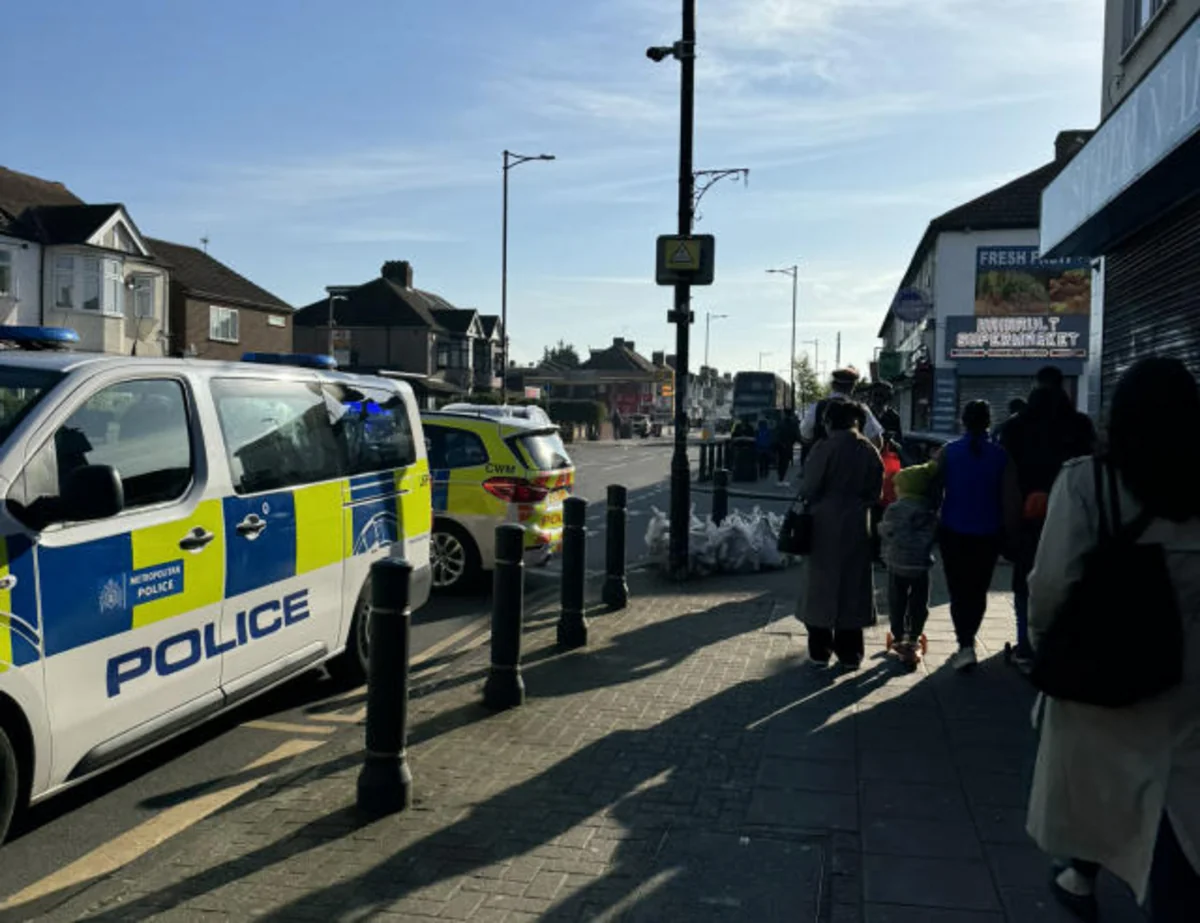 Sword-wielding man held in east London after attacks
