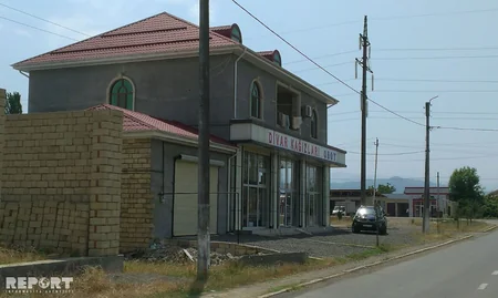 Lənkəranda silahlı şəxslər evə basqın edib - FOTO