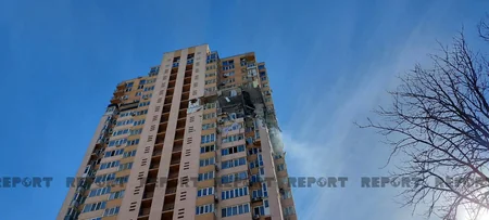 Фоторепортаж Report c места попадания ракеты в многоэтажку в Киеве