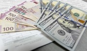 Fitch: Manatın dollara bağlılığının saxlanması Azərbaycanın siyasi prioriteti olaraq qalır