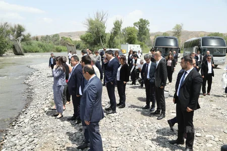 Diplomats, international experts release trouts into Hakari River