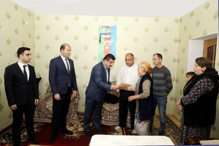 Kürdəmir və Ağsuda şəhid ailələri və müharibə əlillərinə mənzillər verilib