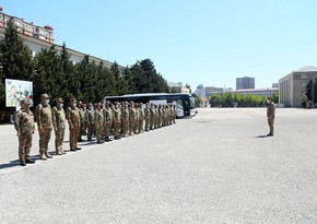 Troops, military vehicles involved in exercises leave for training area