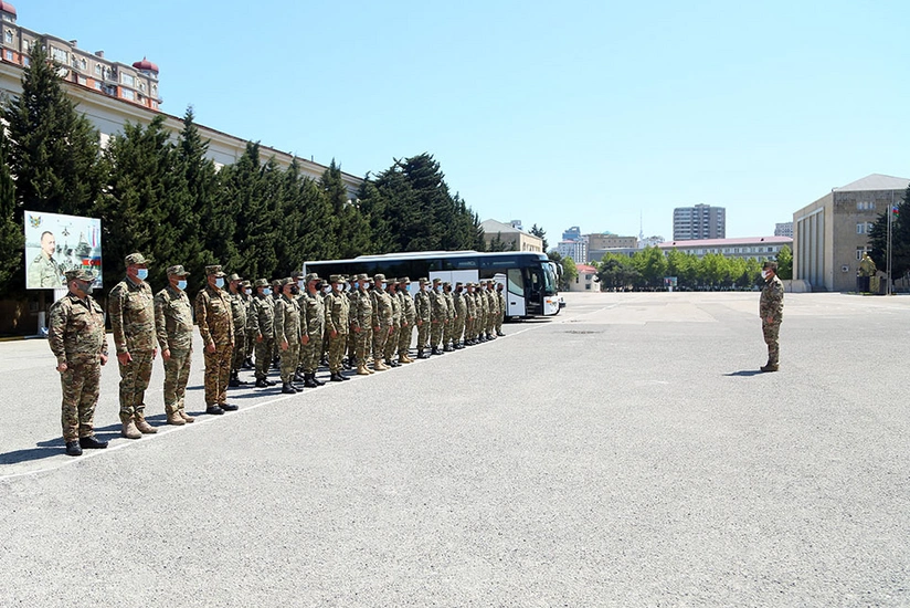 Troops, military vehicles involved in exercises leave for training area