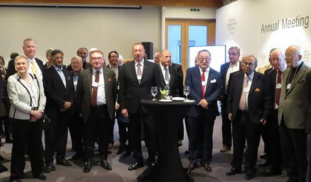 İlham Əliyev Dünya İqtisadi Forumunun icraçı sədri ilə görüşüb