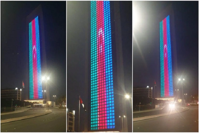 Флаг Азербайджана спроецирован на здание Национальной нефтяной компании ОАЭ