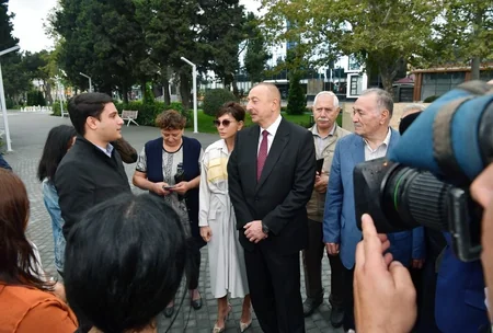 President Ilham Aliyev views conditions created at newly-reconstructed park in Baku