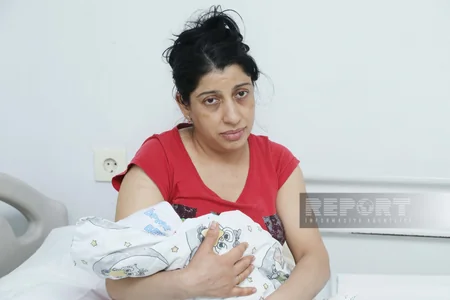 Dördgünlük körpəsi ilə zəlzələ bölgəsindən gələn qadın: Güclə canımızı qurtardıq