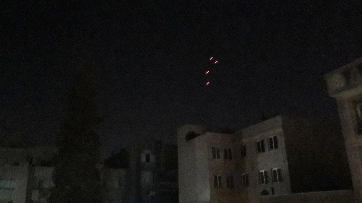 Israel's air defense systems intercepting missiles launched from Iran