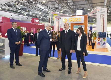 President Ilham Aliyev views Bakutel 2018 exhibition