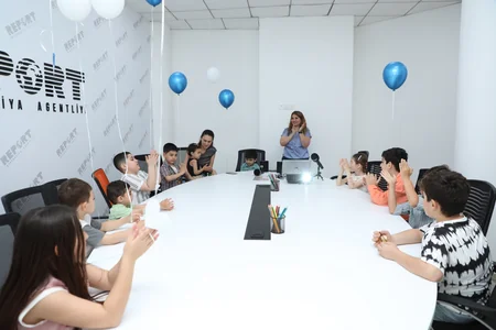 Festive atmosphere at Report News Agency on Children's Day