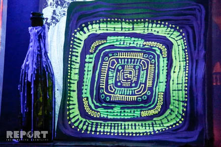 Pictures shining in ultraviolet lamps' light- PHOTOS