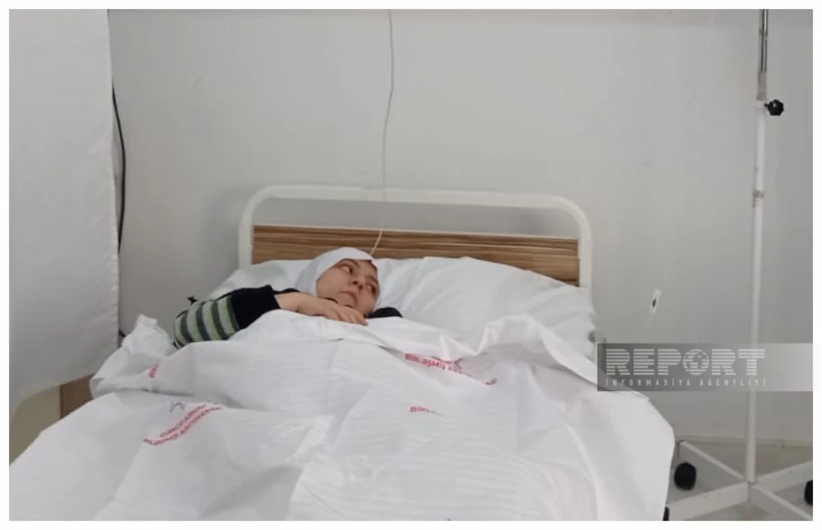 Partlayışda zərər çəkən qadın: Yuxuda idim, bir də ayıldım ki, otağın tavanı üzərimə düşüb